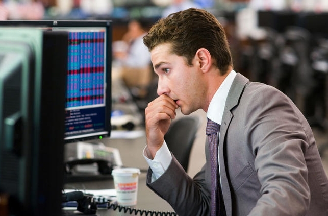 man looking at the computer